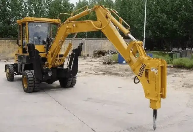 Backhoe Loader with Hydraulic Hammer