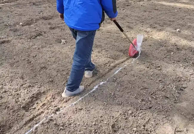 mark the ditch line for digging a straight trench